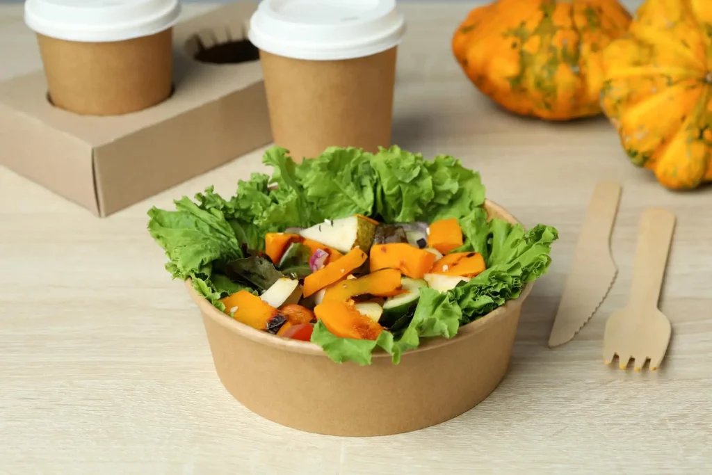 Healthy food with pumpkin salad in sustainable container